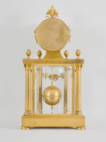 C. Grivolas & Cie., Paris, France, "Pendule 400 Jours" or 400-day clock, year running, spring driven movement with torsion pendulum in a fancy Louis XVI gilt bronze case with four fluted columns before three curved beveled glasses, roman numeral polychrome enamel dial with pierced brass hands, spherical gilt pendulum with extension rod.