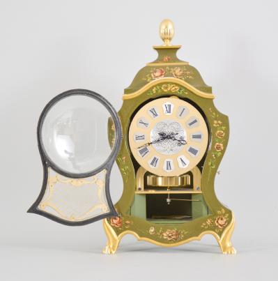 Jaeger-LeCoultre, Switzerland, "Atmos Neuchateloise" clock, caliber 528 jeweled movement, gilt torsion pendulum in a Neuchateloise green painted case with painted floral designs, brass dial with applied roman cartouche numerals, and black metal hands.