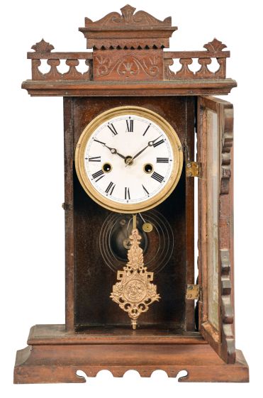 Clocks- 2 (Two) American: (1) wall clock with Waterbury Clock Co. No. 22, time only, double weight driven movement in associated period mahogany case; (2) E. N. Welch Mfg. Co., Forestville, Conn., "Violet", 30 hour, time and strike, spring brass movement shelf clock