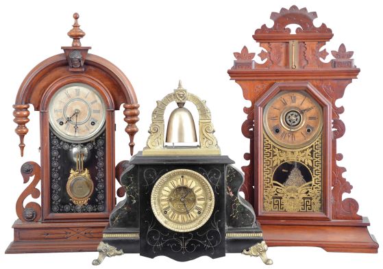 Clocks- 3 (Three): (1) F. Kroeber Clock Co., New York, "Parisian", 8 day, time and strike, spring brass movement walnut mantel clock, c1881; (2) William L. Gilbert Clock Co., Winsted, Conn., "Curfew", 8 day, time and strike, spring brass movement bell top mantel clock, c1900. (3) E. Ingraham & Co., Bristol, Conn., "Pansy", 8 day, time and strike, spring brass movement walnut mantel clock, c1881.