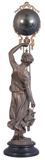 Ansonia Clock Co., New York, "Huntress" figural swinger, 8 day, time only, spring driven movement mounted inside a brass sphere with cast ribbon ornament and applied Arabic numerals, Louis XV style hands, the lower section in gridiron style with smaller sphere at the bottom, all supported by patinated spelter figure of a young woman carrying game birds standing atop an ebonized cast iron base, c1900.
