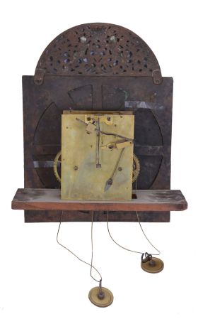 John Green, Skipton, England tall clock, 8 day, time and gong strike, weight driven movement in a chinoiserie oak case with carved coffin top, three quarter columns on hood door and quarter columns on rear of hood on applied molded base. The brass dial has an applied reticulated arch with putti holding a crown, applied cast brass spandrels and calendar and maker