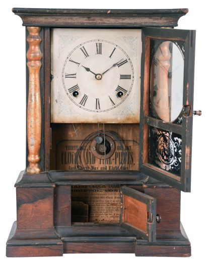 Clocks- 2 (Two): American shelf clocks: (1) Birge, Peck & Co., Bristol, Conn., cornice and column shelf clock with a weight driven, 8 day, time and strike brass strap movement in a mahogany veneered case, c1850; (2) Atkins Clock Co., Bristol, Conn., "London" shelf clock with a spring driven, 8 day, time and strike movement (265B) in a rosewood veneered case, c1865.