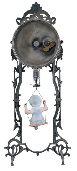 Ansonia Clock Co., New York, "Jumper No. 2" bobbing doll novelty timepiece, 30 hour, time only, spring driven movement that powers the clock and bouncing bisque doll, cast metal stand, 4 inch paper dial.