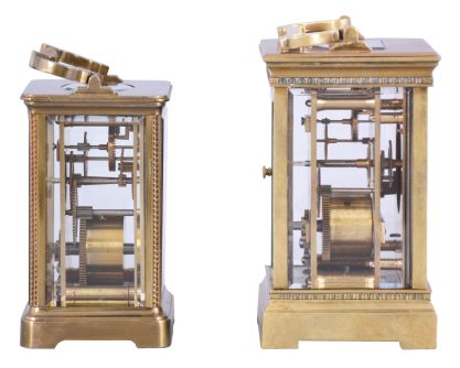 Clocks- 2 (Two) Carriage, both French 8 day timepieces: (1) gilt Anglaise case, Roman numeral white enamel dial with engine turned, gilt mask, and lever platform; (2) fret ornamented Obis case, Arabic numeral white enamel dial signed "Wood, Bicknell & Potter, Providence", with cylinder platform