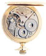 American Waltham Watch Co.,Waltham, Mass., model 1888 "Riverside Maximus", 16 size, 21 jewels, stem wind and set, adjusted, ornately damascened nickel plate movement with lever escapement, cut bimetallic balance, gold jewel settings, gold timing screws, gold wheel train and Church micrometric regulator in a 14 karat, rose gold, hinged back and bezel, scalloped, open face case and Arabic numeral, outer red 5-minute markers, double sunk white enamel dial, blued steel spade and whip hands, serial #7003903, 106.3g TW, c1900.