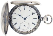 American Waltham Watch Co.,Waltham, Mass., model 1857 "P.S. Bartlett" for T. Bradbury, Paterson, NJ, 18 size, 11 jewels, key wind and set gilt plate movement with lever escapement in a coin silver, engraved hunting case, with Roman numeral white enamel dial, blued steel hands, serial #1869, c1858.