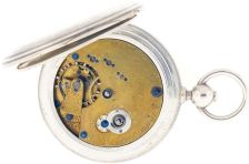 American Waltham Watch Co.,Waltham, Mass., "Appleton, Tracy & Co.", model 1860 with vibrating hairspring stud, 16 size, 15 jewels, key wind and set gilt plate movement with lever escapement and cut bimetallic balance with gold timing screws in a silver, reeded edge, engine turned hunting case and Roman numeral, single sunk white enamel dial, blued steel spade hands, serial #140296, c1865.