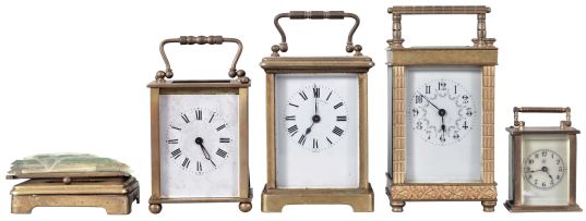 Clocks- 4 (Four) Carriage: Three French carriage clocks, 8 day, time only, two with cylinder escapements and one with a lever. The fourth clock is a Waterbury Clock Co. "Midge" 30 hour, spring driven, lever escapement miniature carriage clock, c1909.