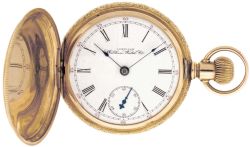 American Waltham Watch Co.,Waltham, Mass., model 1883, 18 size, 7 jewels, stem wind and lever set, damascened, nickel plate movement with lever escapement in a 14 karat, yellow gold, engine turned and engraved hunting case with owners name on gold cuvette and Roman numeral, single sunk, white enamel dial, blued steel spade hands, serial #7965212, 132.2g TW, c1895.