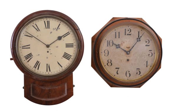 Clocks- 2 (Two) Hanging: (1) England, postal wall timepiece, 8 day, spring driven fusee movement in a walnut veneer case with painted metal dial; (2) Waterbury Clock Co., Waterbury, Conn., "Oak Lever" wall timepiece, 8 day, spring driven, balance wheel movement in an oak case with 12 inch dial.