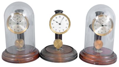 Clocks- 3 (Three) Poole: Poole Mfg. Co., Ithaca, NY, "Executive", electro-mechanical battery-driven mantel timepieces serial numbers1343, 2426, 3676. All with wood bases, two with silvered dials and one with white enamel dial.