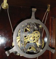 Ansonia Clock Co., New York, "Capitol", 8 day, double weight brass movement wall timepiece.