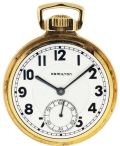 Hamilton Watch Co., Lancaster, Penn., "950 Elinvar", 16 size, 23 jewels, stem wind and lever set, adjusted to 5 positions, damascened nickel plate movement with lever escapement, gold jewel settings, gold timing screws, gold wheel train and whiplash micrometric regulator in a yellow gold filled, screw back and bezel, open face Hamilton "Railroad Model" case, and Arabic numeral, double sunk white enamel dial, black steel hands, serial #2612463, c. 1937