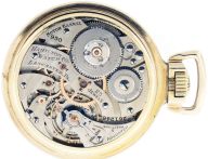 Hamilton Watch Co., Lancaster, Penn., "950 Elinvar", 16 size, 23 jewels, stem wind and lever set, adjusted to 5 positions, damascened nickel plate movement with lever escapement, gold jewel settings, gold timing screws, gold wheel train and whiplash micrometric regulator in a yellow gold filled, screw back and bezel, open face Hamilton "Railroad Model" case, and Arabic numeral, double sunk white enamel dial, black steel hands, serial #2612463, c. 1937