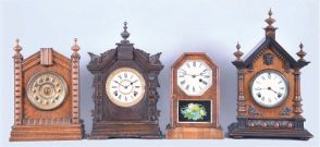 Clocks- 4 (Four): (1) Ansonia TURKEY in golden oak, embossed dial, 8 day; (2) Ansonia TORONTO in oak and with original crazed finish; (3) German copy of octagon top cottage clock, unknown duration, and (4) a German "Alt Deutsch" style shelf clock with a copy of the Ansonia 8 day movement.