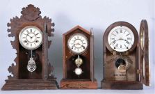 Clocks- 3 (Three) American Shelf: (1) Ansonia Clock Co., New York, "BEAVER", model, pressed walnut gingerbread, 8 day; (2) Wm. L. Gilbert Clock Co.,"OBELISK", in a rosewood veneer case, 8 day and (3) a Seth Thomas "CHICAGO" model from their City Series, 9 day