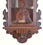 Ansonia Clock Co., New York, "Queen Isabella", 8 day, time and strike in a pressed and carved oak wall case.