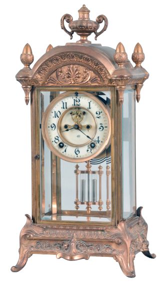 Clocks- 2 (Two) American shelf: (1) Ansonia Clock Co., New York, "La Pau", 8 day, time and strike, spring brass movement porcelain mantel clock; (2) Jennings Brothers. Bridgeport, Conn., crystal regulator, 8 day, time and strike, spring driven movement with visible Brocot escapement in a cast brass and glass case with porcelain dial.