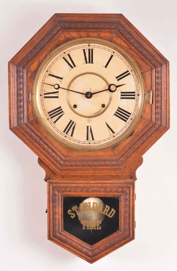 Clocks- 3 (Three) American wall clocks, 8 day, spring driven in oak cases: (1) Wm. L. Gilbert Clock Co. school house, time and strike; (2) Sessions Clock Co., store regulator, time only with calendar; (3) E. Ingraham & Co., store regulator, time only