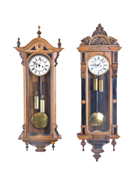 Clocks- 3 (Three) Vienna Regulator, double brass weight driven, time and strike: one in cherry with carved crest and ebony highlights, the other two in walnut