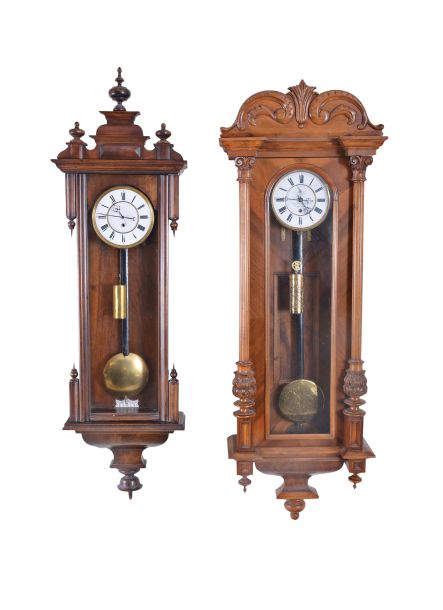 Clocks- 2 (Two) Vienna Regulator, 8 day, weight driven, time only movements: (1) K-K Privilegium, Franz Drexler, mahogany with matching embossed weight and pendulum bob; (2) Unsigned, walnut case