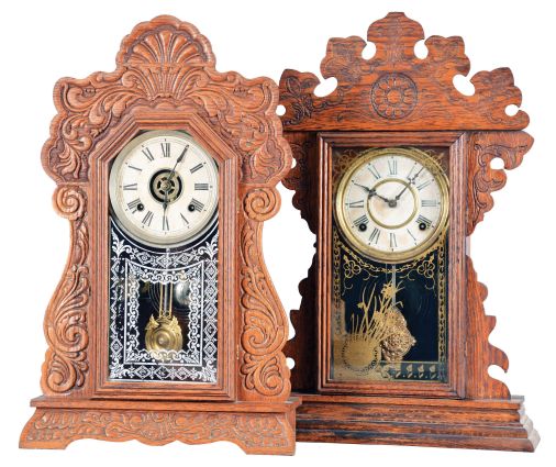 Clocks- 2 (Two) American Shelf: (1) E. N. Welch Mfg. Co., Forestville, Conn., "Assortment A. No.3" mantel clock, 8 day, time and strike, spring driven movement in a pressed oak case, c. 1900; (2) Ansonia Clock Co., New York, "Aden" mantel clock, 8 day, time and strike with alarm, spring driven movement in pressed oak case, c1906.