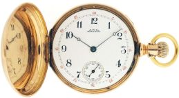 American Waltham Watch Co.,Waltham, Mass., "Amn. Waltham Watch Co.", model 1874, 14 size, 15 jewels, stem wind and lever set, adjusted, damascened nickel plate movement with lever escapement, cut bimetallic balance, gold timing screws and Woerd micrometric regulator in a 14 karat, rose gold hunting case, the front cover with engraved cipher, and rear with engraved crest, Arabic numeral, outer red 5-minute markers, single sunk white enamel dial, blued steel Breguet style hands, serial #2120542, 97.7g TW, c1885.