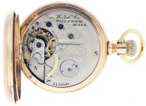 American Waltham Watch Co.,Waltham, Mass., "Amn. Waltham Watch Co.", model 1874, 14 size, 15 jewels, stem wind and lever set, adjusted, damascened nickel plate movement with lever escapement, cut bimetallic balance, gold timing screws and Woerd micrometric regulator in a 14 karat, rose gold hunting case, the front cover with engraved cipher, and rear with engraved crest, Arabic numeral, outer red 5-minute markers, single sunk white enamel dial, blued steel Breguet style hands, serial #2120542, 97.7g TW, c1885.