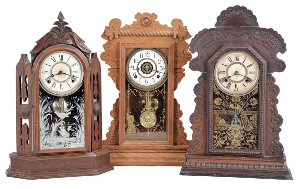 Clocks- 3 (Three): (1) William L. Gilbert Clock Co., Winsted, Conn., "Turret", 8 day, time and strike, spring brass movement shelf clock, c1881 (2) Waterbury Clock Co., Waterbury, Conn., "Mansfield", 8 day, time and strike, spring brass movement shelf clock, c1891 (3) Ansonia Clock Co., New York, "Kenisco", 8 day, time and strike, spring brass movement shelf clock, c1901