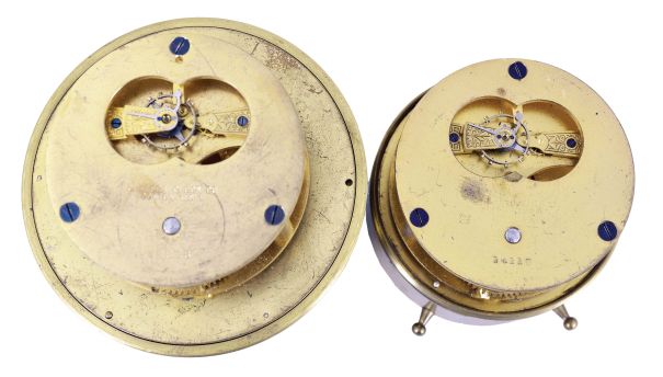 Clocks- 2 (Two) Chelsea Dash Clocks: (1) Chelsea Clock Co., Boston for Bigelow, Kennard, & Co., Boston, "Special Auto" car clock, 8 day, time only, spring-driven balance wheel movement with 2.75in silvered dial in a brass case which in turn is held within a brass dash-mounted case. Serial number 14117, c1906; (2) Chelsea Clock Co., Boston for Steward & Clark Mfg. Co., Chicago, 8 day, time only, spring-driven brass movement with a 3.5in silvered dial in a brass tub for mounting in a vehicle or instrument panel. Serial number 42828, c1909.