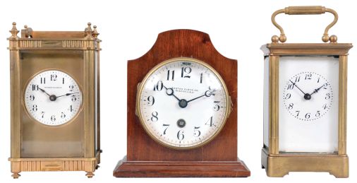 Clocks- 3 (Three) Boston and Vermont Clocks: (1) Boston Clock Co., Boston, "Sparta" carriage clock, 8 day, time only, spring-driven balance wheel movement in a gilt brass case with signed white enamel dial, serial number C4611; (2) Boston Clock Co., Boston, desk clock, 8 day, time only, spring-driven balance wheel movement in a mahogany case with white enamel dial, serial number 16322B; (3) Probably Vermont Clock Co., Fairhaven, VT, carriage clock, 8 day, time only, spring-driven balance wheel movement in a gilt brass case with white enamel dial.