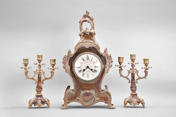 A.D. Mougin, Paris for Camerden & Forster of New York, mantel clock, 8 day, time and strike, spring driven pendule de Paris movement in a Louis XV style case with tortoise shell veneer and rococo style brass ornament, white enamel dial with retailer