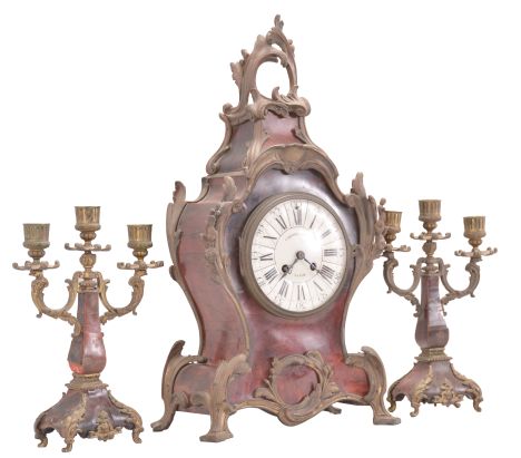 A.D. Mougin, Paris for Camerden & Forster of New York, mantel clock, 8 day, time and strike, spring driven pendule de Paris movement in a Louis XV style case with tortoise shell veneer and rococo style brass ornament, white enamel dial with retailer