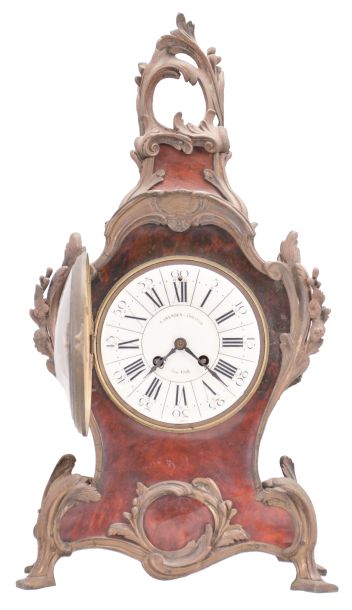 A.D. Mougin, Paris for Camerden & Forster of New York, mantel clock, 8 day, time and strike, spring driven pendule de Paris movement in a Louis XV style case with tortoise shell veneer and rococo style brass ornament, white enamel dial with retailer