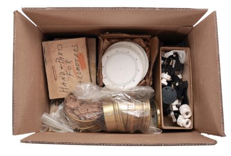 3 (Three) Boxes of Instrument Parts: lot includes sextant sun shades and mirrors, pelorus and compass dials, gyrocompass parts, many sextant telescopes, reflecting prisms for telescopic alidades, micrometer drums for sextants, barometer tubs and dials, and more.