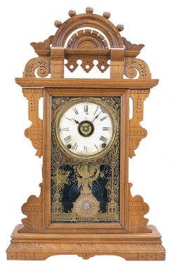 Seth Thomas Clock Co., Thomaston, Conn., "Eclipse", 8 day, time, strike and alarm spring brass movement walnut case mantel clock.