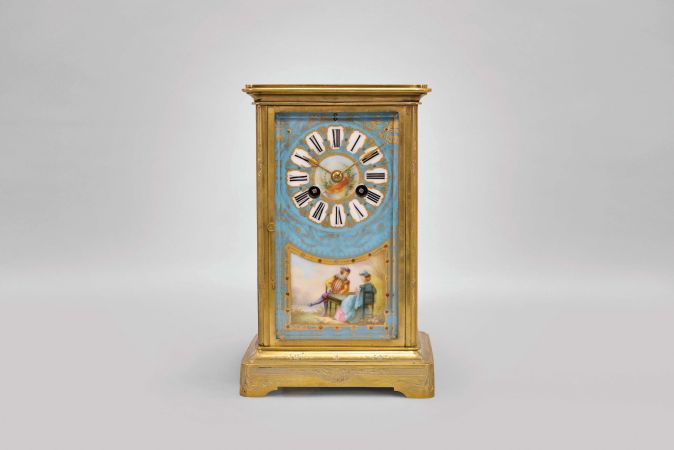 France, table or mantel regulator with polychrome enamel panels, the engraved, crystal regulator style case with sides and dial featuring men and women in gardens and landscapes, wearing fanciful Elizabethan costume, the panels bordered in blue, and dial with blue ground, and having Roman numerals within gilt bordered cartouches, gilt spade hands, 8 day, two train pendule de Paris movement, striking the hours and half hour in passing