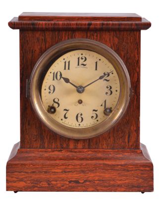 Seth Thomas Clock Co., Thomaston, Conn., "Dana No. 1" shelf clock with a spring driven, 8 day, time and strike movement in an adamantine finish case.