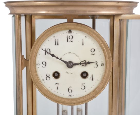 Charles Hour, Paris, for Bigelow, Kennard, & Co., Boston, crystal regulator, 8 day, time and strike, spring driven pendule de Paris movement with Brocot escapement and compensating pendulum in an oval form glazed gilt brass case with cream colored enamel dial with arabic numerals and blued steel hands.