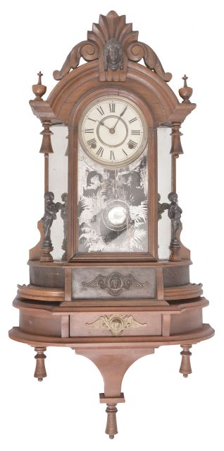 Clocks- 2 (Two): (1) Ansonia Clock Co., New York, "Triumph" mirror-side shelf clock, 8 day, time and strike, spring driven movement in a walnut case with modern shelf matching the clock