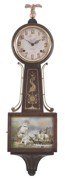 Clocks- 2 (Two): (1) E. Ingraham Co., Bristol, Conn., "Yankee Clipper" banjo clock, 8 day, time and strike, spring driven movement in a mahogany case, c1934; (2) Reproduction "Willard" banjo clock fitted with quartz movement, c1979.