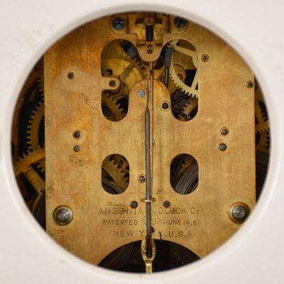 Ansonia Clock Co., New York, "La Marne", 8 day, time and strike spring brass visible escapement movement porcelain mantel clock.