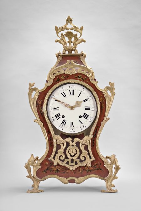 Pierre Le Doux, a Paris, a large, early 20th century reproduction of a Louis XV bracket clock, with 18th century movement, the red hardwood case and bracket with polychrome floral ornament, the bracket with landscape scene featuring a dog at the base of a tree and looking at a bird, and mounted with cast, chased brass naturalistic ornament, roman numeral concave/ convex white enamel dial, pierced and engraved gilt hands, signed brass movement with five baluster pillars and of at least two week duration, with recoil escapement, count wheel striking, and silk thread suspension