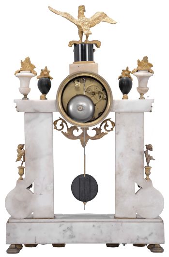 Dupas, a Paris, a late 18th century marble and gilt bronze mantel clock, the base on eight decorated feet, and with inset, scrolling foliate mounts, columns and pilasters supporting a stepped entablature with gilt bead molding, the columns in black marble with gilt capitals and bases, encircled with a spiral, leafy vine, the white pilasters with flanking, scroll buttress bases, mounted with a hanging garland, scrolling at the bottom, and terminating in a floral roundel, the clock case with scrolling foliate pendant, flanked by four urns with gilt flowers, and surmounted by an eagle with outstretched wings, and resting on a black pedestal with gilt festoon, roman numeral white enamel dial signed "Dupas a Paris", fancy gilt hands, 8- 15 day pendule de Paris movement with recoil escapement, silk thread suspension, and count wheel striking