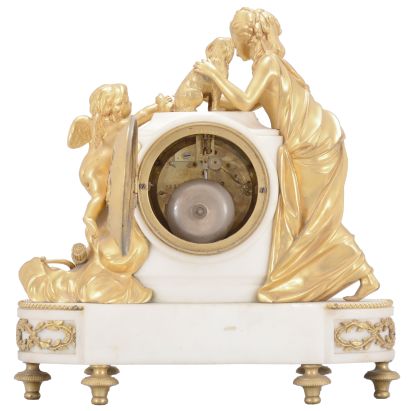 Samuel Marti, Paris, France, figural mantel clock, 8 day, time and strike, spring driven pendule de Paris movement in a white marble case on turned brass feet with applied gilt ornaments, supporting gilt figures of a woman, dog, and Cupid, white convex enamel dial with Arabic numerals and gilt fleur-de-lis hands.