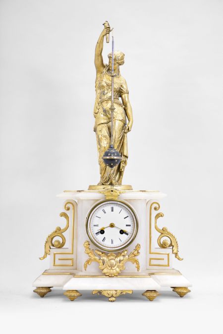 Japy Fils, Paris, France, figural mystery clock, 8 day, time and strike, spring driven movement with conical pendulum in a white alabaster case on cast feet with applied gilt ornaments, surmounted by a gilt female figure holding the pendulum aloft, Roman numeral white enamel dial, and gilt spade hands.