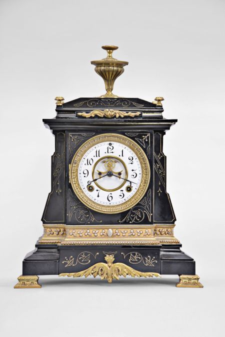 Ansonia Clock Co., New York, 8 day, time and strike spring brass movement enameled iron case mantel clock. We could not find this model in the catalog.