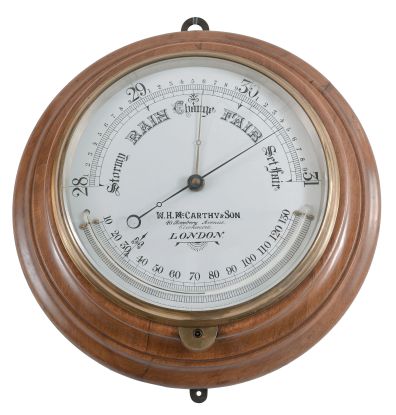 W. H. McCarthy & Son, London, large aneroid barometer and thermometer.