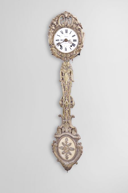 France, Morbier or Comtoise clock, 8 day, time and strike with simple calendar, weight driven movement with anchor escapement in an iron post and plate frame, convex white enamel dial with Roman numerals signed "Dufour à Erneé", press brass fronton and matching pendulum with scroll design, two pierced brass hands an one iron hand.